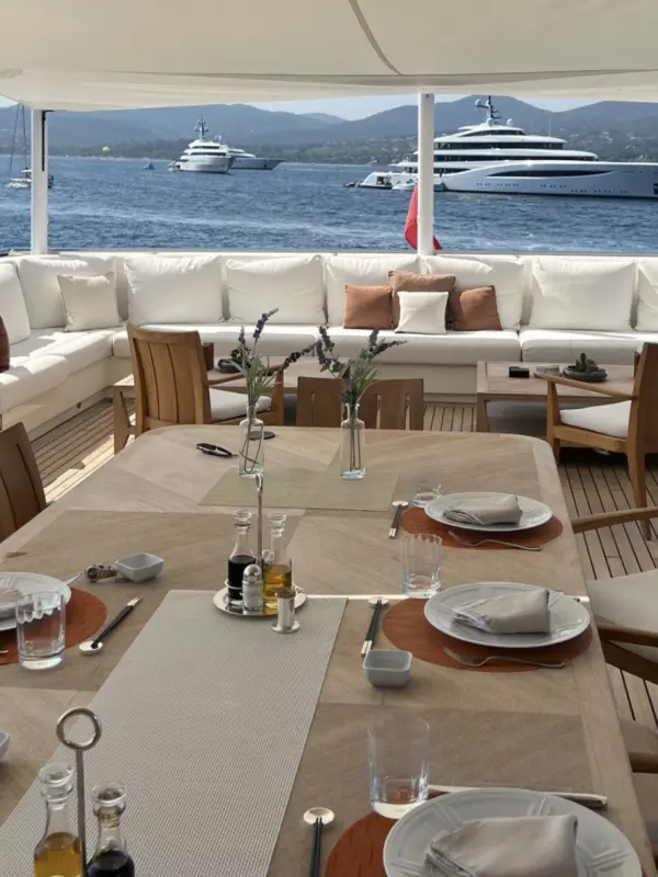 Yacht guest area prepared for private onboard dining