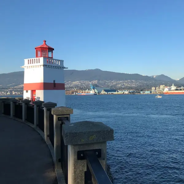 Mountain coastline and yacht route through Howe Sound